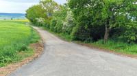 Ende-Gelände: Hier hörten die Straßenbauer mit der Teerung an Panoramaweg auf