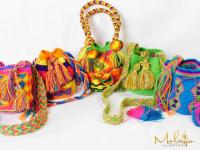 Einhundertfünfzig edle schwarz-braune Handtaschen ersetzen nicht die frohen Regenbogen-Farben einer „Mochila Wayúu".